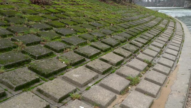 Inner city flood protection concrete wall next to river