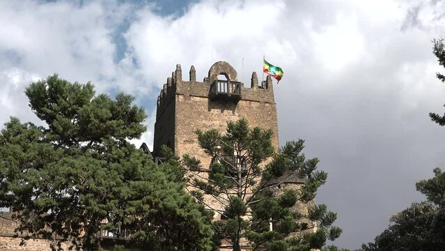 A stone ruins of medieval castle. Historic fortress in Gondar, cultural heritage and famous monument in Ethiopia. Unesco world heritage. Building, old architecture.