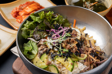 Korean food, soybean paste stew, spicy pork, bibimbap, side dishes, vegetables, kimchi, earthen pot,
