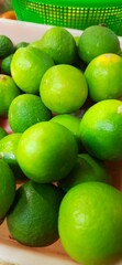 Many of green lemon. Different jeruk nipis and jeruk limau background.Sold in Indonesian local market