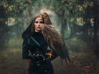 art portrait real people fantasy woman holding white-tailed eagle wild bird on hand. Elf warrior...