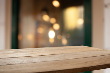 3D rendering, wooden top table with bokeh light effect and blurred cafe restaurant in the background, windows background blur