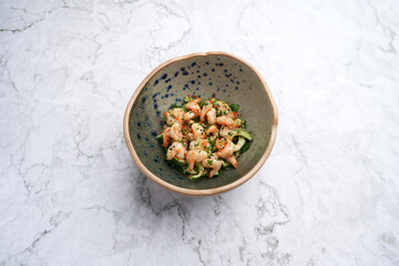 Shrimps salad with avocado and herbs