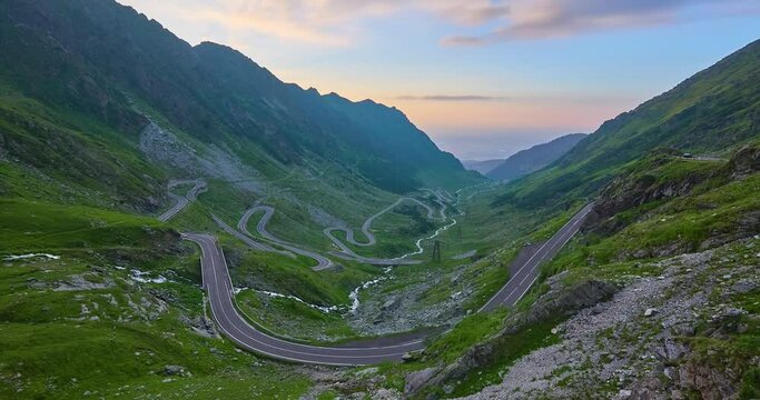  Time lapse of the Transfagarasan Mountain Road at late afternoon with a large amount of holiday traffic transversing the Carpathian Mountains in the country of Romania