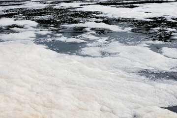 Foam on the surface of a river.