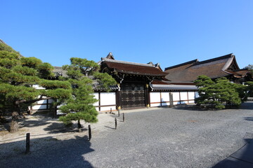 Shoin Gate in Nishi Hongwanji Temple, Kyoto, Japan (Japanese words on the stone statue mean 