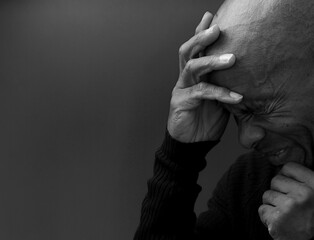 black man praying to god with black grey background with people stock image stock photo	