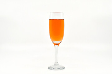 Flute glass of pink champagne isolated on a white background. Copy space, No people.