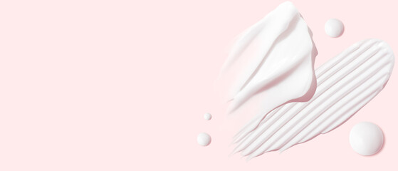 Set of smears of cream and drops of transparent gel on a pink background. Empty space