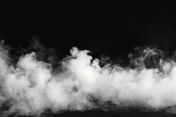 Fototapeta premium A captivating black and white photo capturing smoke rising from the ground. Perfect for adding a mysterious and atmospheric touch to various creative projects