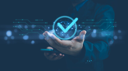 Quality, service guarantee, Validation concept for business process automation, quality assurance management,certification, digital transformation. businessman touching checked icon on virtual screen.