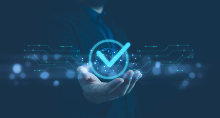 Quality, service guarantee, Validation concept for business process automation, quality assurance management,certification, digital transformation. businessman touching checked icon on virtual screen.
