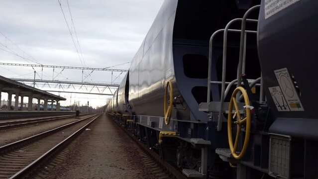 freight locomotive on rails delivering oil