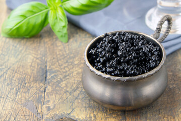 delicious appetizer black caviar in a bowl