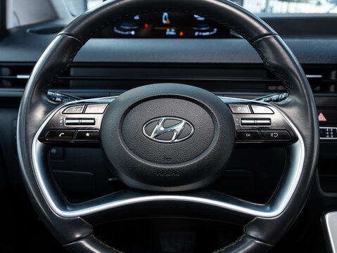 Novosibirsk, Russia - February  02 , 2024:  Hyundai Grand Starex, cockpit interior cabin details, speedometer and tachometer. Black leather interior..