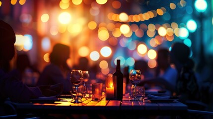 People hanging out having and listening to music together at roadside Restaurant on bokeh background - obrazy, fototapety, plakaty