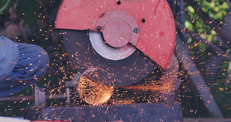 Hot flame welding metal work cutting fire iron workshop. Welding machine iron metal sparking....