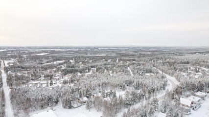 Aerial view of snowy Rovaniemi Lapland in Finland. Whiteness of Lapland with Christmas spirit.