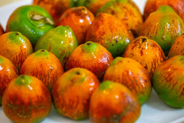Rare and exotic fruit of the peach palm (Bactris gasipaes), typical fruit of the Brazilian tropical forests, Amazonas, Pará, Rondônia and Acre