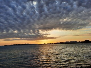 Fototapeta premium A beautiful view of sunset and clouds at Jeddah Corniche in the evening. 