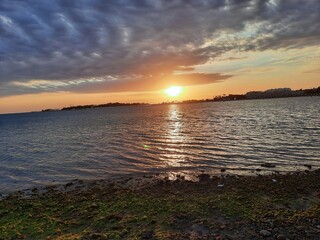 A beautiful view of sunset and clouds at Jeddah Corniche in the evening.
