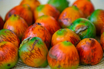 Rare and exotic fruit of the peach palm (Bactris gasipaes), typical fruit of the Brazilian tropical forests, Amazonas, Pará, Rondônia and Acre