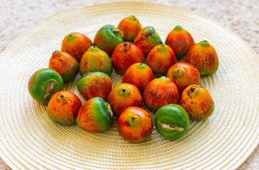 Rare and exotic fruit of the peach palm (Bactris gasipaes), typical fruit of the Brazilian tropical forests, Amazonas, Pará, Rondônia and Acre