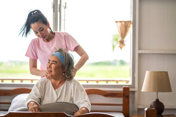 Obraz premium Portrait of enjoy happy love asian family senior mature mother and young daughter smiling play laughing and having fun together at home, care, elderly, insurance.happy family and Mother Day concept