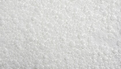 White foam plastic or styrofoam as texture or background, top view