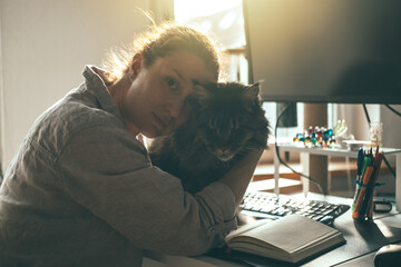 Intimate Home Office Scene with Cat