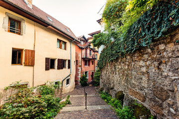 Architecture medieval old town exterior building, narrow alley street in city of Annecy