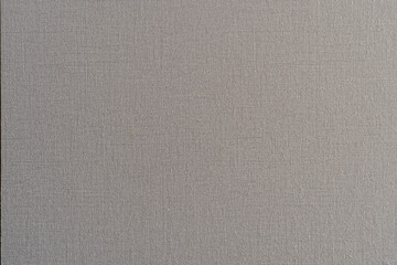 Close up detail of grey fabric texture background. Can be used as wallpaper.