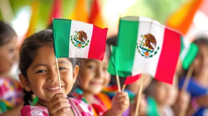 Foto op Canvas many children holding a small Mexican flag on a stick in their hands, on the street at a parade © yanapopovaiv