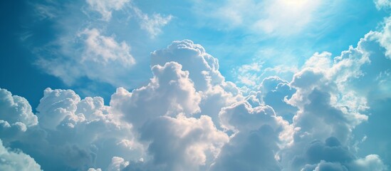 Blue Sky with Fluffy Clouds as Background Material: Blue Sky, Clouds, and Background Material in Spectacular Harmony