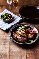 Grilled Turkey Breast with fresh salad. Close up.	