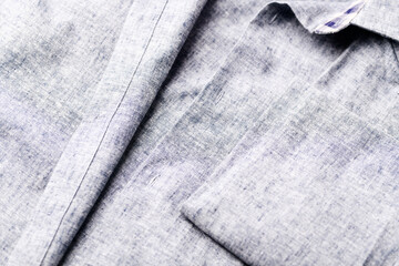 Close up of men's striped shirt. Soft focus.	