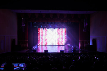 Texture blur and defocus, background for design. Stage light at a concert show.