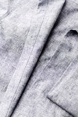 Close up of men's linen shirt. Soft focus.	