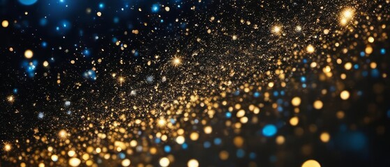 De focused blue gold background of abstract glitter lights. 