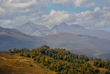Russia. The Elbrus region. The high mountain peaks of the North Caucasus are surrounded by morning...