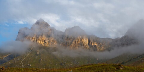 Russia. The Elbrus region. The high mountain peaks of the North Caucasus are surrounded by morning...