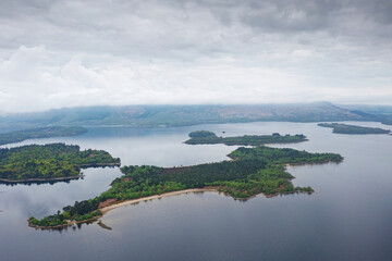 Loch Lomond aerial view showing islands Inchtavannach, Inchconnachan, Inchcruin and Inchfad