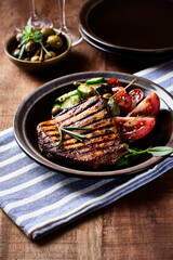 Grilled Turkey Breast with fresh salad. Close up.	