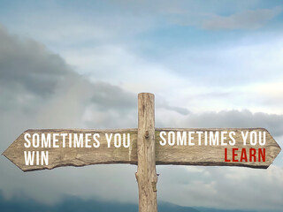 Inspirational motivational quote - Sometimes you win sometimes you learn. Text on wooden arrow sign...
