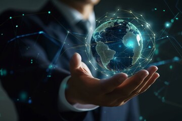 A businessman examining a hologram of the Earth, indicating global awareness, sustainability, and international business strategies. - obrazy, fototapety, plakaty
