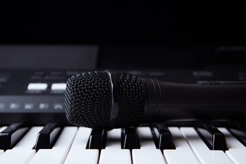 Microphone on keyboard . Close up.	