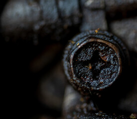Used Engine gear or steel machinery as a background. Used Nut  and oil Stain on a dark background.