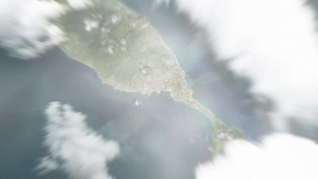 Earth zoom in from space to Basseterre, Saint Kitts and Nevis. Followed by zoom out through clouds and atmosphere into space. Satellite view. Travel intro. Images from NASA