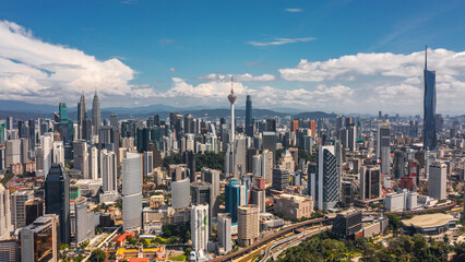 Cityscape of Kuala Lumpur on a sunny day. Aerial view