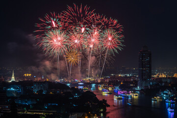 Beautiful fireworks Phra Phuttha Yodfa Bridge or Memorial Bridge light up with fireworks event...